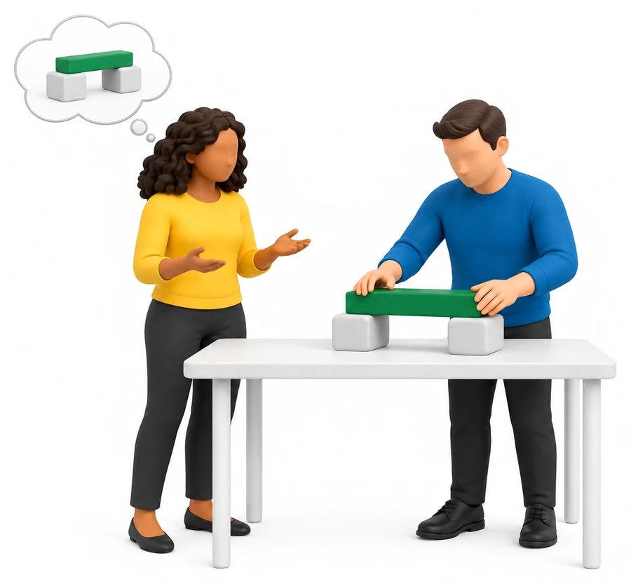 One person describing an idea while another builds it